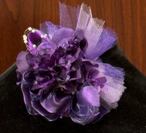 Petite African violet corsage -DESIGNS WILL VARY -  NO Stem - Clusters of African violets on a leaf - Embellished with ribbon and pearls - Ribbon and pearls will vary  - CLARA -Delta Sigma Theta African Violet Dress  corsage Petite African violet corsage -DESIGNS WILL VARY -  NO Stem - Clusters of African violets on a leaf - Embellished with ribbon and pearls - Ribbon and pearls will vary  - CLARA -Delta Sigma Theta African Violet Dress  corsage