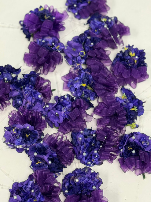 THE COLLEGIATE - Delta “mini” - 4" African violet corsage - COLLEGIATE - African violet florals- Approx. 3.5" - 4" in size - DESIGNS WILL VARY - Ribbon and Tulle will vary - corsage for Deltas - African violets