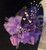 African violet corsage for Deltas - DESIGNS WILL VARY - ALANA - African violets - ribbon and pearls - African violet corsage - Purple ribbon - Floral clusters on an medium-length leaf - Delta Sigma Theta African Violet Corsage