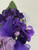 African violet corsage for Deltas - DESIGNS WILL VARY - ALANA - African violets - ribbon and pearls - African violet corsage - Purple ribbon - Floral clusters on an medium-length leaf - Delta Sigma Theta African Violet Corsage