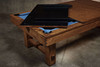Top view of the Doc & Holliday Churchill Rustic Pool & Billiard Table in Distressed Burl Pine with a 3-piece dining top leaf flipped over, revealing Championship blue felt beneath. Distressed finish and custom buffalo nickel billiard sights highlight its USA-built craftsmanship.