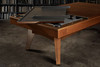 The Scholar Slate Pool Table is shown with its optional dining top in place, transforming it into a multi-functional furniture piece. This visual highlights the table’s versatility for upscale homes and hospitality spaces, where form, function, and elevated design are essential. Made in the USA, it transitions effortlessly from game night to dinner party.