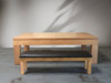 Side view Paula Parsons pool table by Doc & Holliday in glazed maple with dining top and bench on concrete floor, modern design