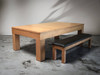 Side view Paula Parsons Slate Pool Table by Doc & Holliday in glazed maple with dining top and bench on concrete floor, modern style