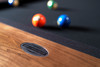 Close-up of the Doc & Holliday Billiards steel brand plate stamped Made in USA on the Marvin Muse. A hallmark of authenticity and American craftsmanship.