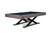 Three-quarter angle of The Metalsmith pool table by Doc & Holliday, shown on a clean white background. Highlights the oversized black powder-coated X-leg steel base and hardwood apron with black Championship felt — a modern industrial luxury design.