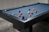 Overhead view of the Jackies slate pool table by Doc & Holliday in sleek black maple finish, showing the full three-piece slate playing field, Championship felt, and tapered maple rails. Proudly made in the USA.