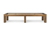 Paula Parsons shuffleboard table by Doc & Holliday in glazed maple, captured from a three-quarter studio angle to show the depth of the solid maple frame, recessed scoring, and the thickness of the butcher block playfield