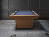 Front view of Doc and Holliday Kaci Slate Pool Table with dining top installed glazed maple modern game room furniture