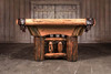 Front profile of the Woodslee pool table highlighting the handcrafted pine log base and rustic lodge styling.