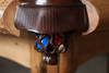 Leather basket pocket on the Woodslee rustic log billiard table.