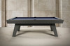 Angled side view of the George Marble Grey Ash Slate Pool Table showing the grey ash wood grain, clean rail profile, blue felt, and mid-century modern leg design.