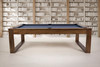 3/4 environmental view of the Doc & Holliday Redford Slate Pool Table in Van Dyk finish with Academy Blue felt, visible wood grain, clean rails, and a modern minimalist base.