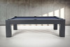 Side photo shoot view of the Peter Parsons Slate Pool Table in Matte Smoke with solid maple construction, straight rails, and substantial modern legs.