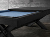 3/4 view of the Doc & Holliday Portland Black Ash pool table with dining top off and blue felt showing.