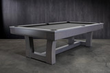 ¾ hero view of the Doc & Holliday Everly Slate Pool Table in Smoke Maple finish, professionally shot with a styled backdrop. Showcases the sculptural wave-inspired legs, curved apron design, and genuine three-piece slate playfield with a clean, design-forward presence.