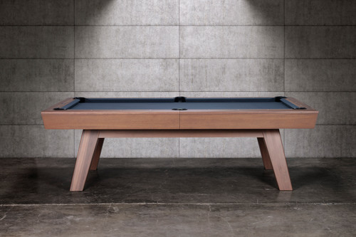Side view of the George Pool Table highlighting the clean Gray Walnut finish and long, refined silhouette. The angled mid-century modern legs and enclosed leather drop pockets emphasize craftsmanship and style, making this slate pool table a designer centerpiece.