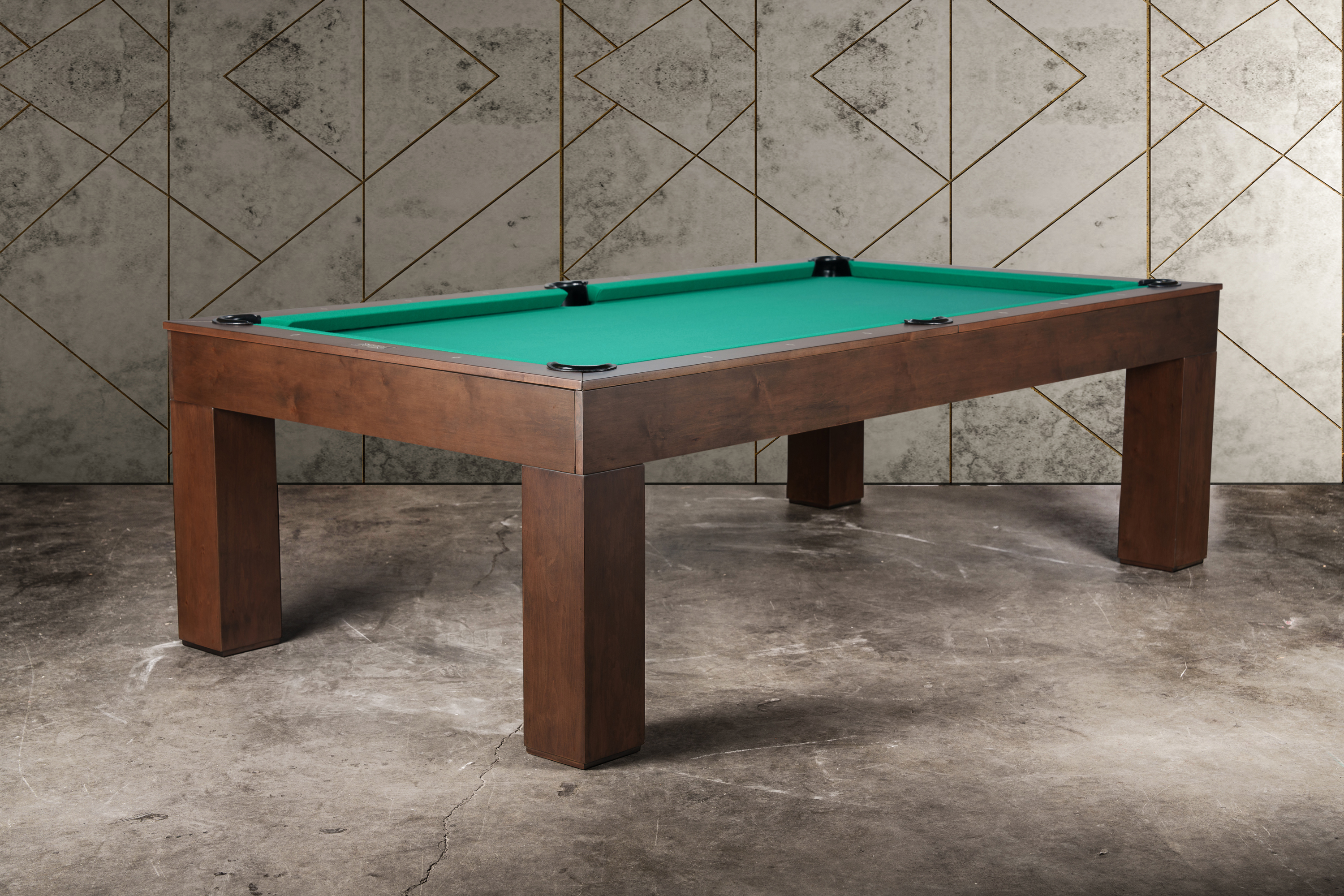 hree-quarter hero view of the Doc & Holliday Paula Parsons Slate Pool Table in Antique Coffee, showing slate playfield, leather pockets, and Parsons design in a modern interior.