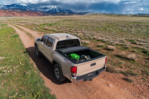 UnderCover Ultra Flex Hard Folding Truck Bed Tonneau Cover | Fits RAM 1500 DT w/RAMBOX