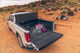 UnderCover Armor Flex Hard Folding Tonneau Cover | RAM 1500 DT w/RAMBOX