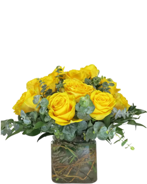 Ray of Rose compact arrangement with yellow roses and eucalyptus in a cube vase, available at ABQ Florist in Albuquerque NM Ray of Rose compact arrangement with yellow roses and eucalyptus in a cube vase, available at ABQ Florist in Albuquerque NM