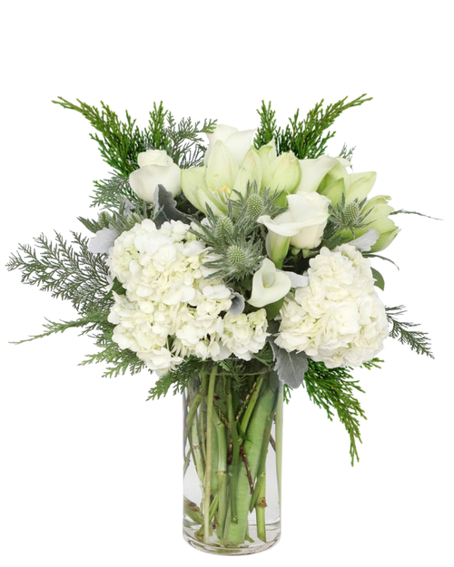 Winter Whisper tall white flower arrangement with lilies, callas, and evergreens in Albuquerque NM