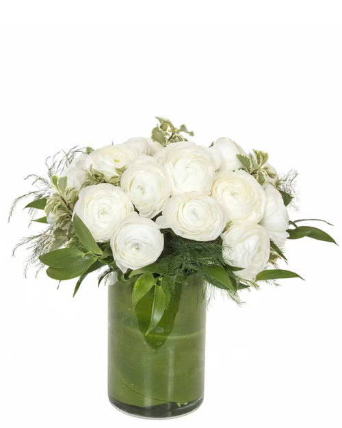 Cloud Nine Ranunculus arrangement with white ranunculus and greenery in a glass vase in Albuquerque