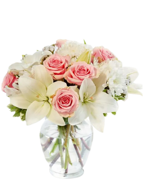 Amazing Amelia floral arrangement with light pink roses, white Asiatic lilies, and white cushion poms in a clear glass vase, Albuquerque florist
