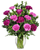 Purple Muse Carnations arrangement featuring purple and lavender carnations with green hypericum berries in a clear glass vase, Albuquerque florist