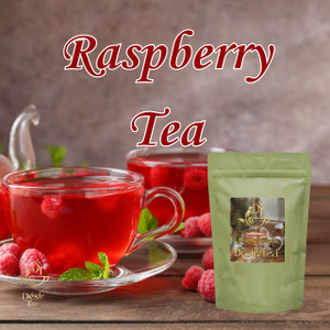 Desir Tea Raspberry Tea next to a glass cup of bright red raspberry tea and fresh ripe raspberries.