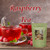 Desir Tea Raspberry Tea next to a glass cup of bright red raspberry tea and fresh ripe raspberries.