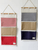 Multi-Function Wall Hanging Storage Bag  Cotton fabric pouch striped splicing closet door sundries organizers Home 3 Large Pockets Sundry Wall Bags pouches in white with blue red stripes, wooden hang bar and hang strap Multi-Function Wall Hanging Storage Bag  Cotton fabric pouch striped splicing closet door sundries organizers Home 3 Large Pockets Sundry Wall Bags pouches in white with blue red stripes, wooden hang bar and hang strap