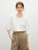 Women's Crewneck linen-blend short sleeve with drop shoulders pleats button-up Blouse - French-Inspired look round O-neck & ¾ Half long lantern dropped sleeves Design Top in white Womens summer pleated blouses Crew neck petite size office wfh workwear Tops #25FS12298