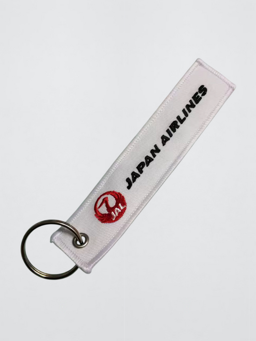 Japan Airlines Keychain Embroidered logo with stainless steel silver metal clip Key Chain Airplane Keychains Flight Crew Pilot Aviation memorabilia in white with red, black accent Japan Airlines Keychain Embroidered logo with stainless steel silver metal clip Key Chain Airplane Keychains Flight Crew Pilot Aviation memorabilia in white with red, black accent