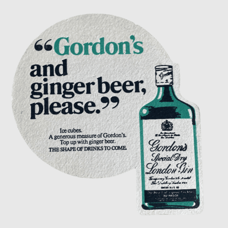 Gordon’s Gin Drinks Coaster   London Special Dry Table Drinkware accessory Vintage The Shape of Drinks to Come Beer Mat Drinkware Paper cardboard Coasters Collection Barware beermat accessories mats  British Pub UK Nightclub Club Restaurants Bar Collectors United Kingdom England U.K. Classic Expressions collectors antique