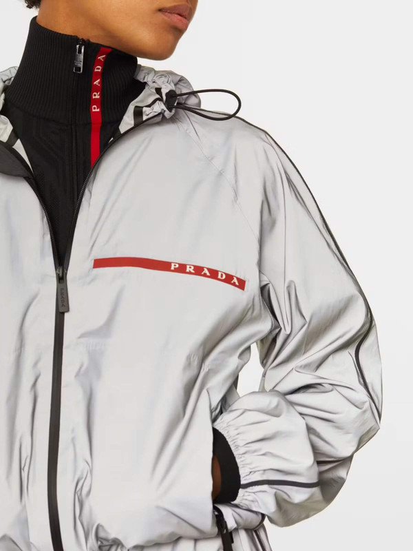 Prada Reflective Zip Jacket Silver   Womens long sleeves mockneck hooded drawcord full zipper-up closure zip slant patch and chest pockets Jackets for woman Petite-, tall-, plus-size womens outerwear