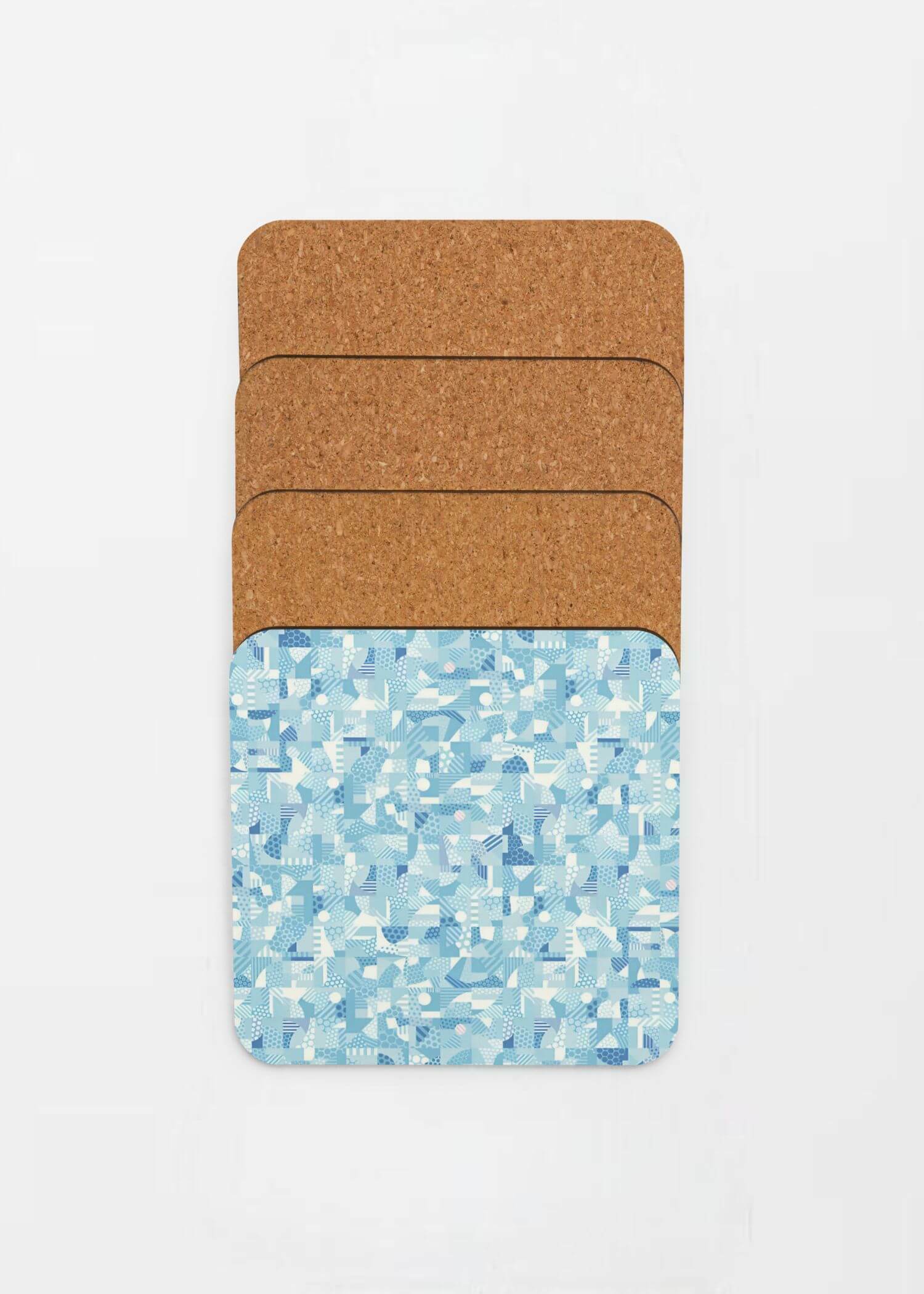 miteigi Cork-Back Freez Coaster   Traditional Japanese circle pattern designed by miteigi drinks coasters in blue with white mozaic pattern