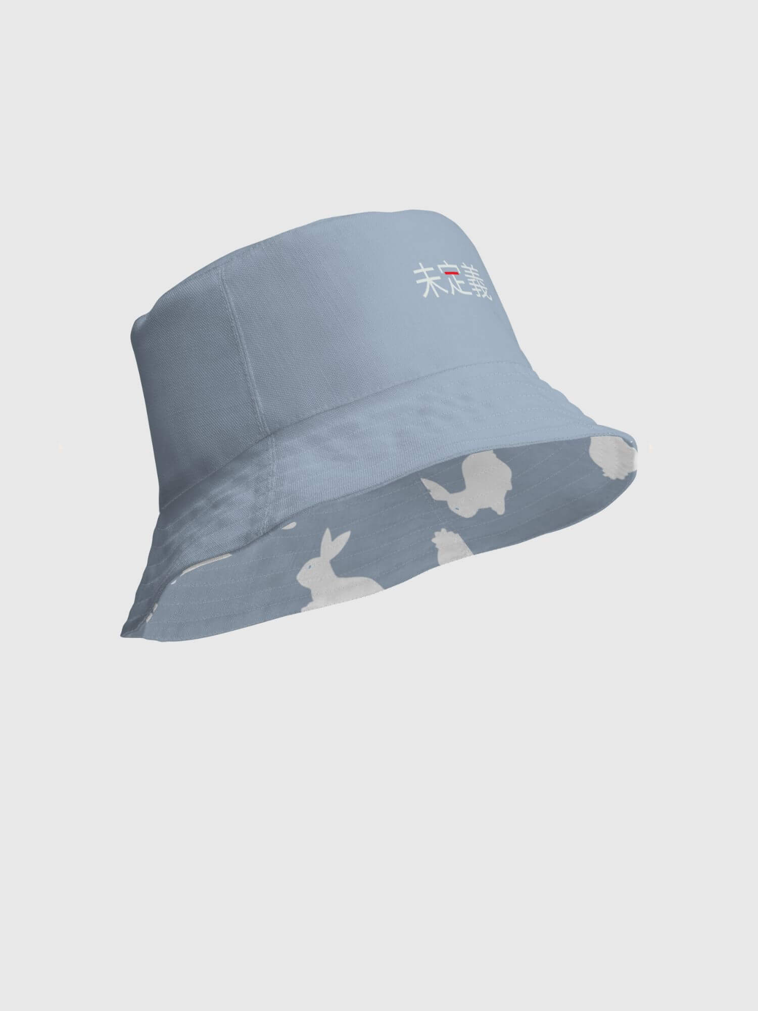 Reversible unisex headwear     Genderful Women’s Men’s Unisex anywear summer festival sun hats for woman man in dusk blue with white rabbits pattern on one side, plain with Japanese script miteigi undefined logo in platinum red on other side Mens womens getaway holiday vacation beachwear Headwear