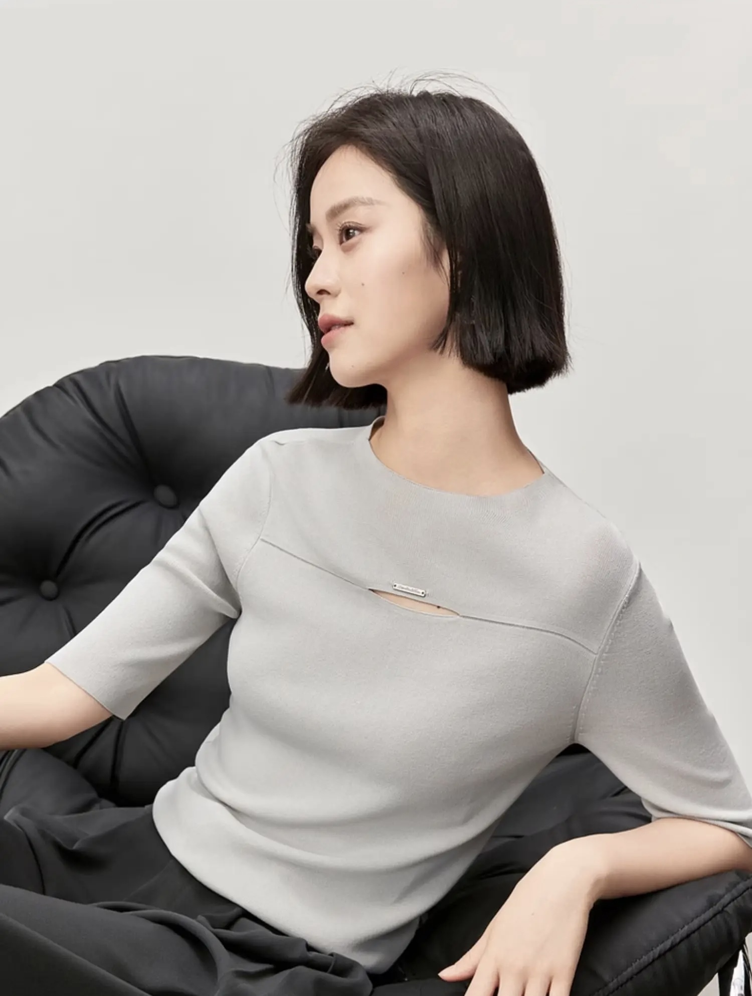 Slit Crewneck T-Shirt   Women’s hollow out knitted T-shirts for woman in gray  Womens Fall Autumn Slim half sleeves round O-neck metal logo solid simple elegant crew neck tees Tshirt Office wfh workwear vacation getaway holiday Tops in light grey #W43H56237