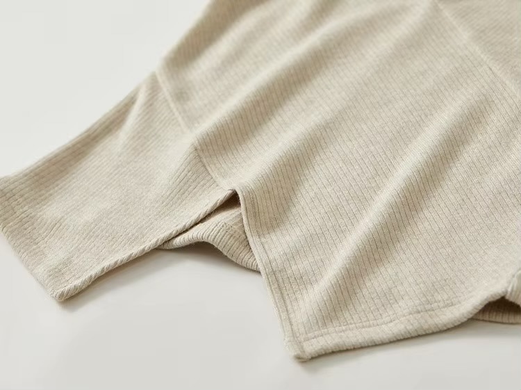 Irregular Knit T-Shirt    Women’s Patchwork slim fit solid knitted round O-neck long sleeves slit pullover tees for woman in Oats oatmeal color Female petite-, plus-, size ribbed crewneck T-shirts Fall Autumn Winter womens rib crew neck clothing tops #143T57003