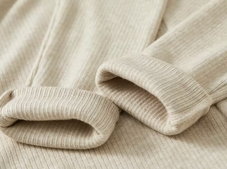 Irregular Knit T-Shirt    Women’s Patchwork slim fit solid knitted round O-neck long sleeves slit pullover tees for woman in Oats oatmeal color Female petite-, plus-, size ribbed crewneck T-shirts Fall Autumn Winter womens rib crew neck clothing tops #143T57003