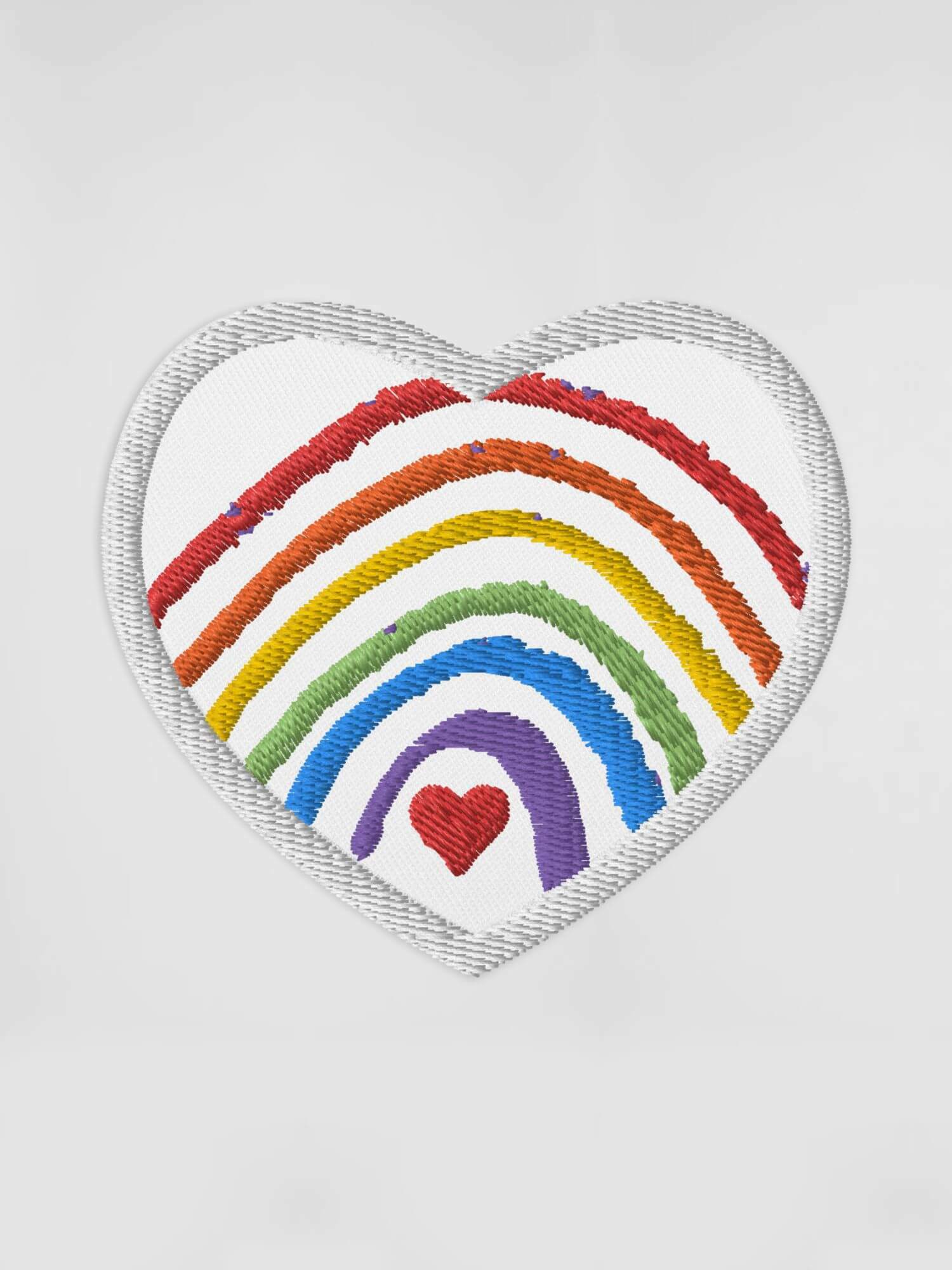 Rainbow Heart Embroidered Patch      Genderful Cartoon rainbow rainbows in white with multicolor pattern Anime Gifts love hearts rainbows lgbtqia+ Iron-on, sew-on, or safety pin attachment patches