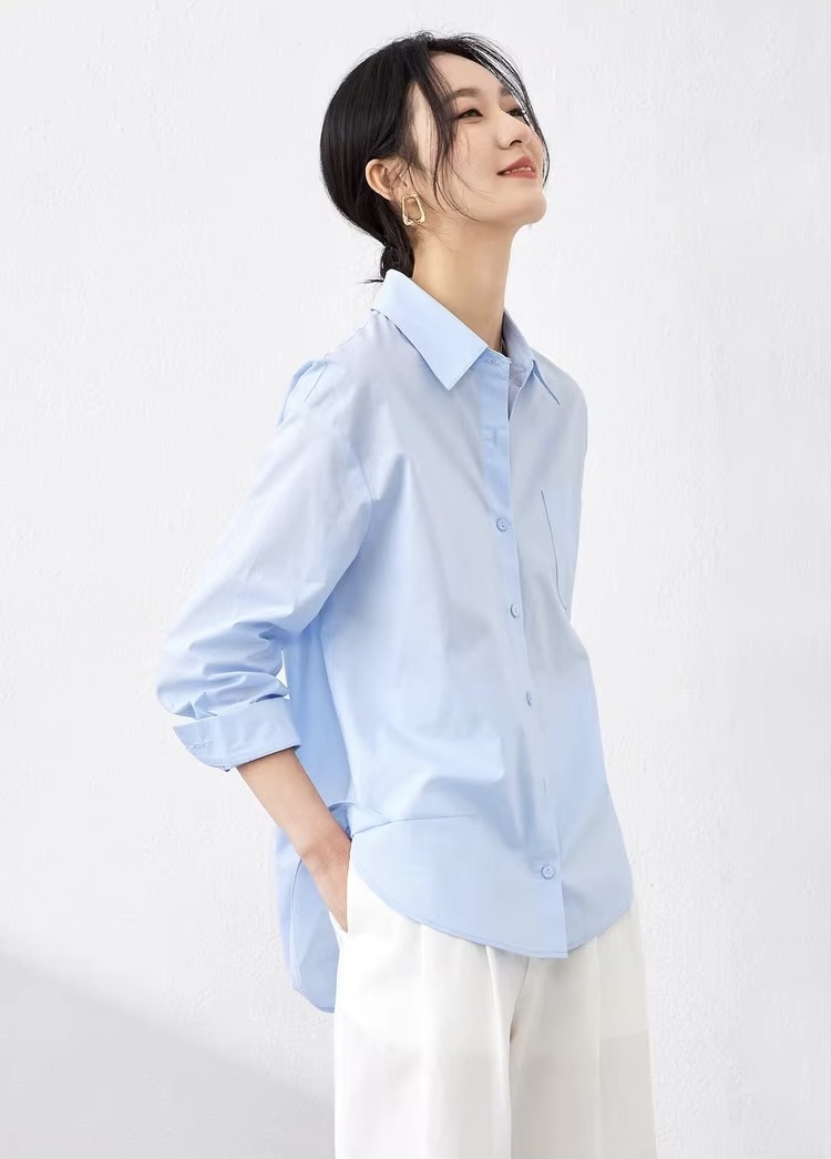 Classic Big Shirt    Women’s solid turn-down collar asymmetrical long sleeves with dropped shoulders and banded button cuffs button-up 100% cotton patch pocket at chest bottoming hem Shirts & Blouses in light blue womens fashion Spring Office Lady wfh workwear Tops #143C58007X