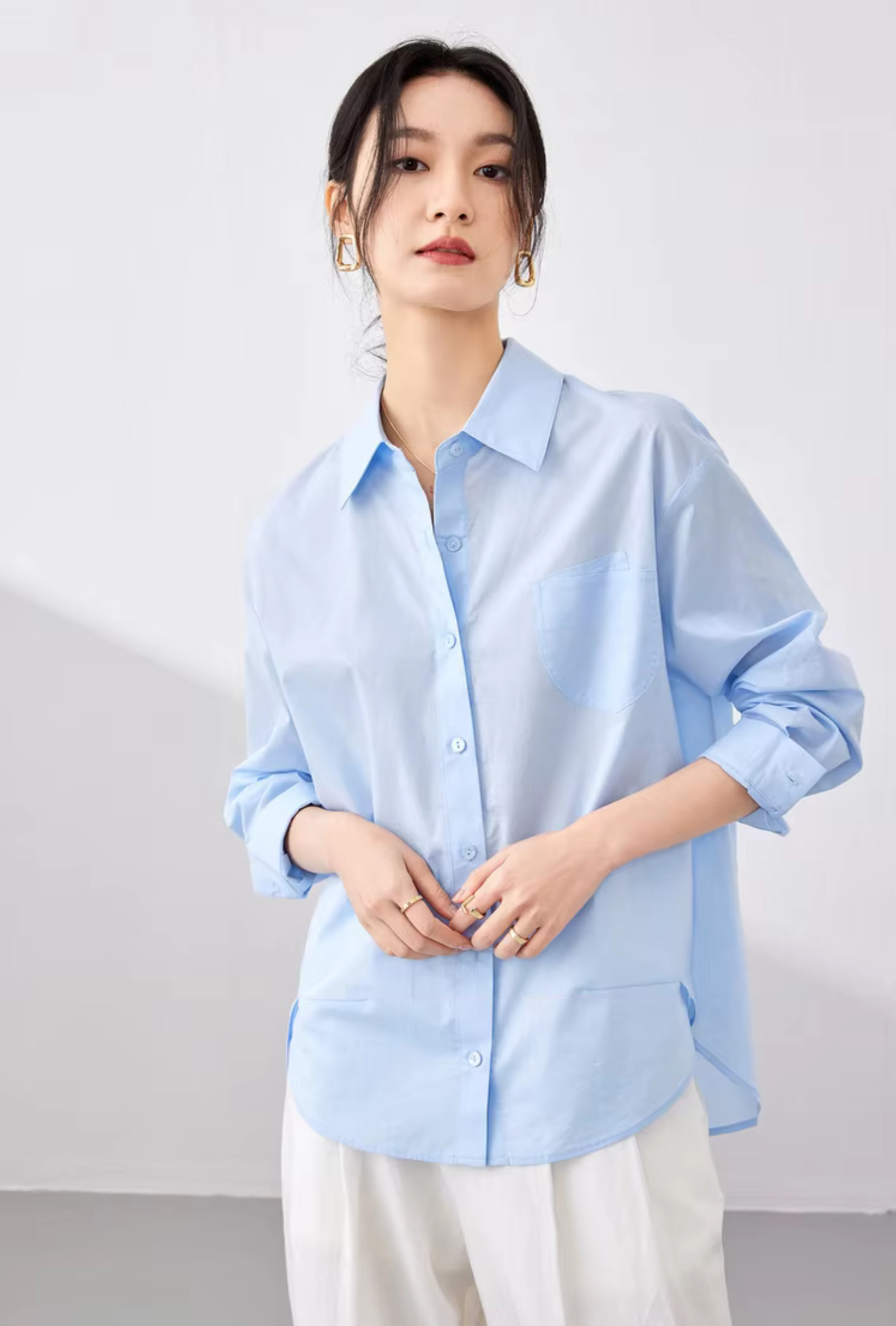 Classic Big Shirt    Women’s solid turn-down collar asymmetrical long sleeves with dropped shoulders and banded button cuffs button-up 100% cotton patch pocket at chest bottoming hem Shirts & Blouses in light blue womens fashion Spring Office Lady wfh workwear Tops #143C58007X