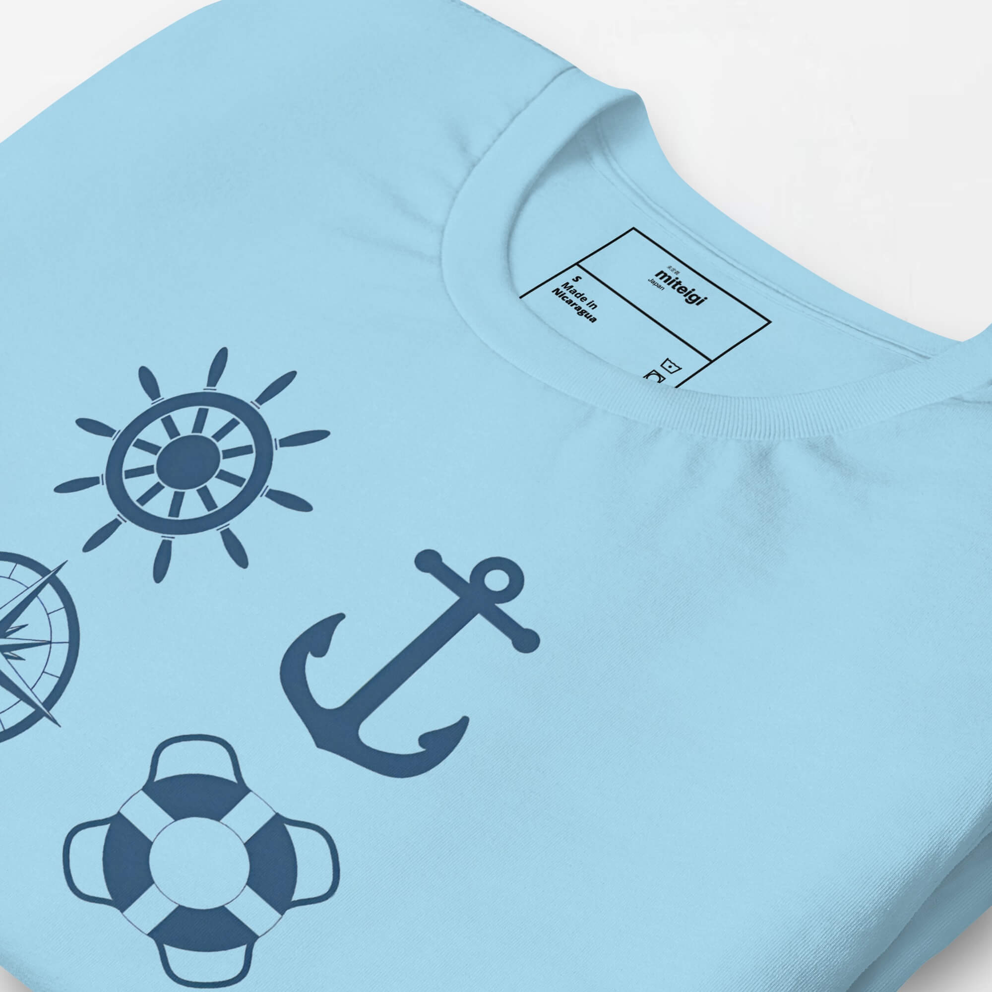 Bella + Canvas x miteigi Logo Crewneck Unisex T-Shirt blue    Unisex anywear Women’s Men's Short Sleeves o-neck Japanese Casual Solid Color Cartoon Nautical Yachting Sailing anchor lifebuoy compass sail wheel rudder steering symbols characters Logo Branded product item Beach travel vacation holiday getaway womens mens crew neck round Tops T-Shirts for tall-, plus-, size man woman sailors boating yachts boats ships maritime oceans marine shipping Genderful tees