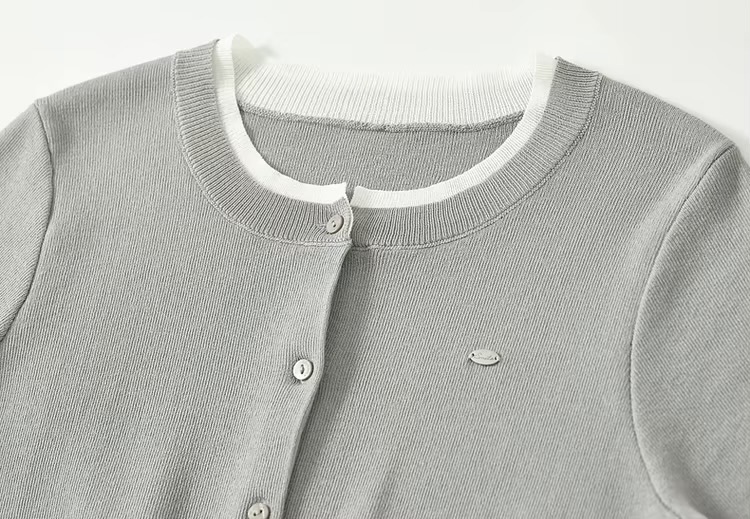 Spliced Knit Crewneck Cardigan  Women’s slim fit round crew neck collar single breasted button-up short sleeves patchwork accent trim ribbed rib band hem cardigans for woman in gray Chic Tops Spring womens grey alt-g alernative office wfh workwear petite-, plus-, size fashion #W51H58750