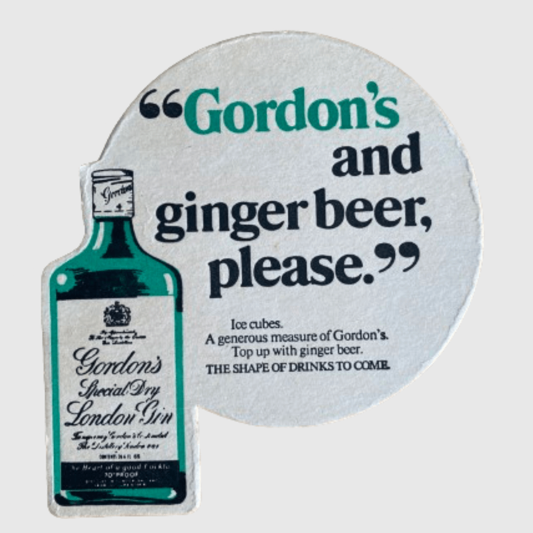 Gordon’s Gin Drinks Coaster   London Special Dry Table Drinkware accessory Vintage The Shape of Drinks to Come Beer Mat Drinkware Paper cardboard Coasters Collection Barware beermat accessories mats  British Pub UK Nightclub Club Restaurants Bar Collectors United Kingdom England U.K. Classic Expressions collectors antique