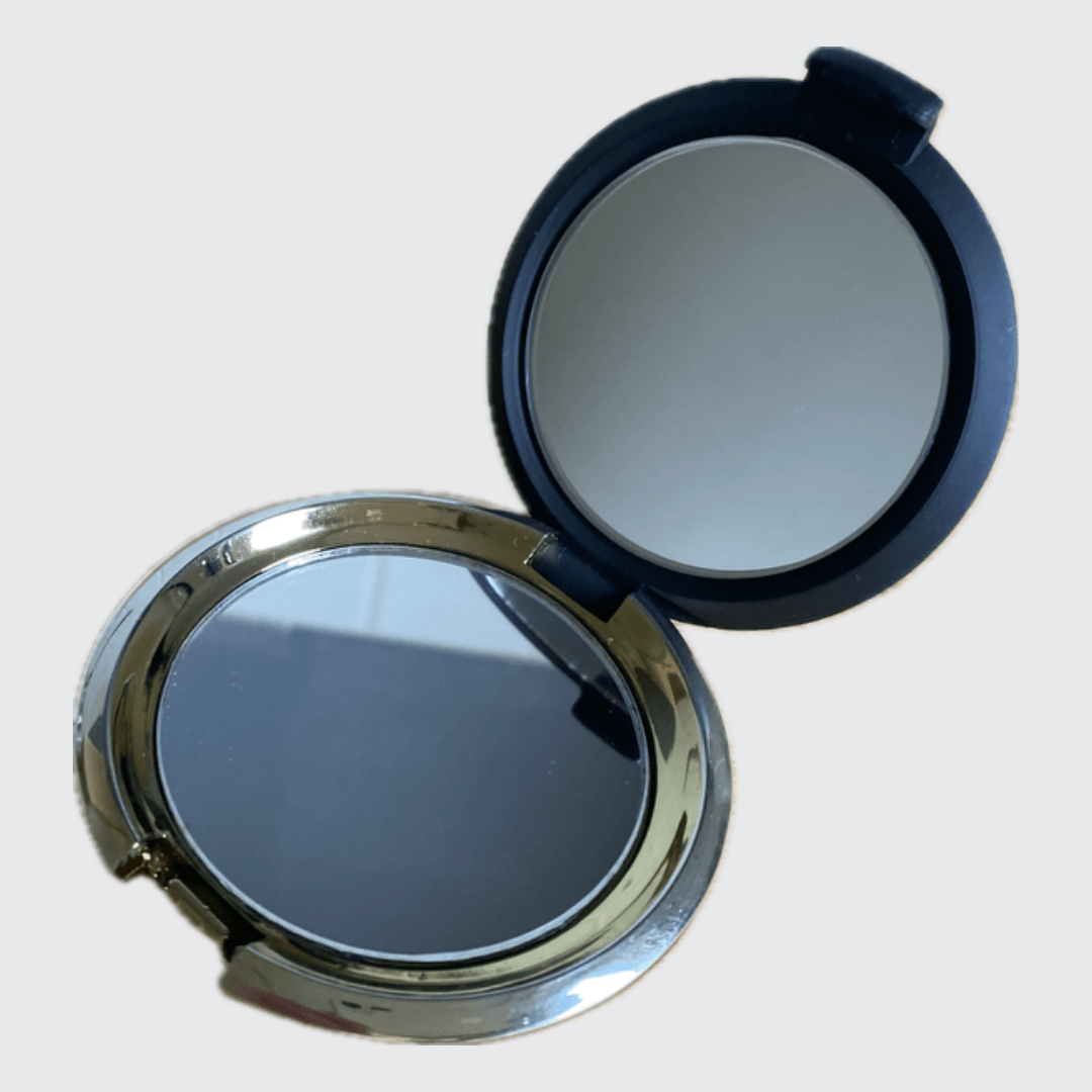 Compact Vanity Mirror   A vintage classic cosmetic make-up travel getaway vacation holiday round folding latch closure beauty skincare mirrors in black non-slip with golden metal collectors antique collectible fashion style