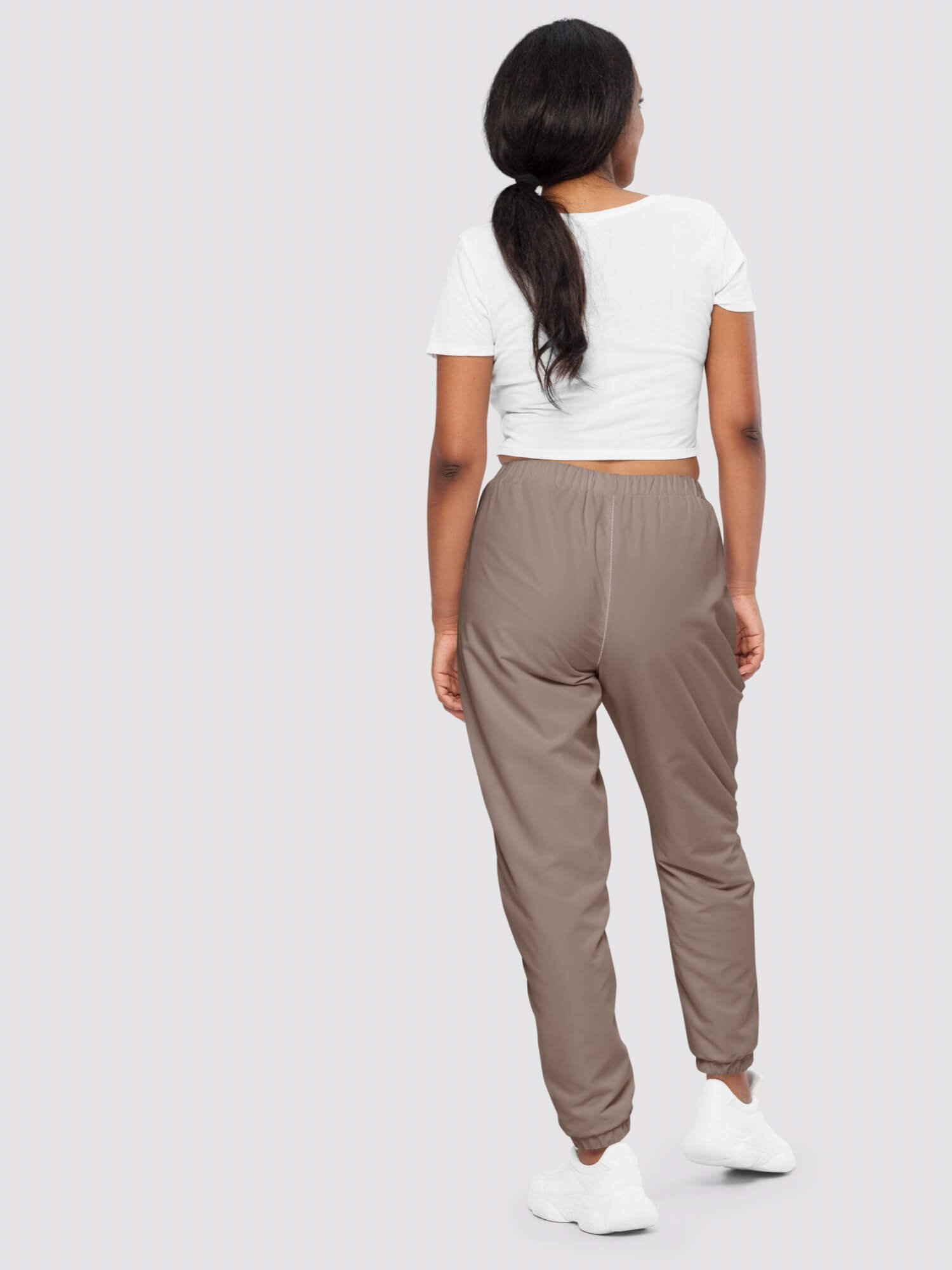 Runaround Track Pants  Genderful Women’s mid rise elastic waist with drawcord slant side zipper pockets fitness sports ankle cuffs joggers for woman in Hampton rock brown color Women’s petite-, tall-, plus-, size activewear everyday sportswear 