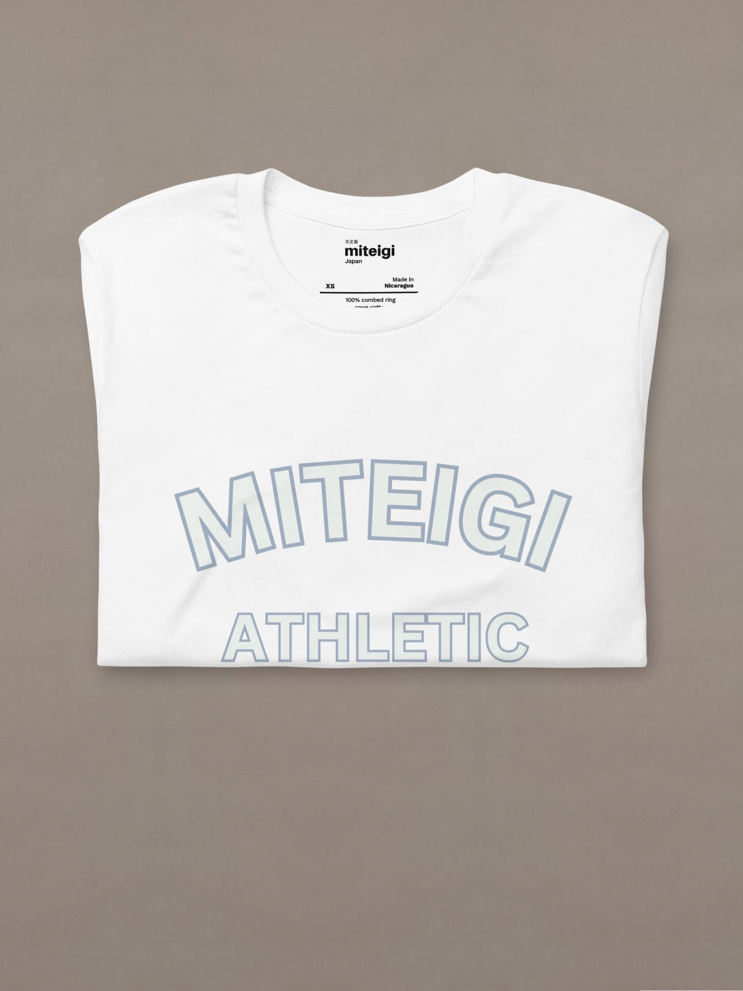 Track T-Shirt 7     Genderful women’s white with Myst blue and light memory green lucky number 7 Detail on back and MITEIGI ACTIVEWEAR est. 2017 logo on front crewneck sports tops for woman  Short sleeves 100% combed and ring-spun cotton fitness activewear T-shirts womens sportswear